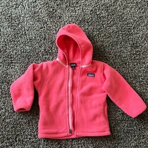 Pink Patagonia full zip fleece.
